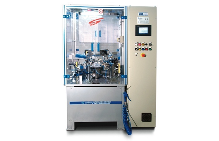 Hine with rotary table to assemble fender spring in plunger